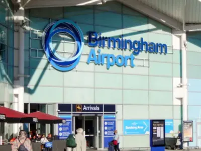Where is the Birmingham Airport Smoking Area Located?